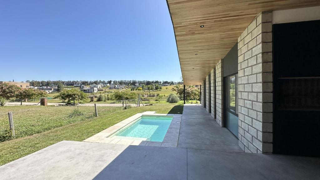 Casa Pit - Casa en chapa con pileta Barrio Privado 6PX I Hola Sur